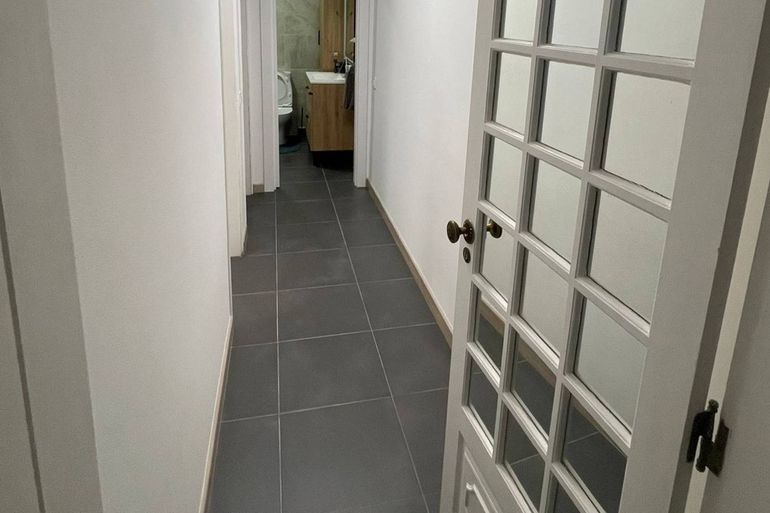 imagem projeto apartamento em faro corredor depois